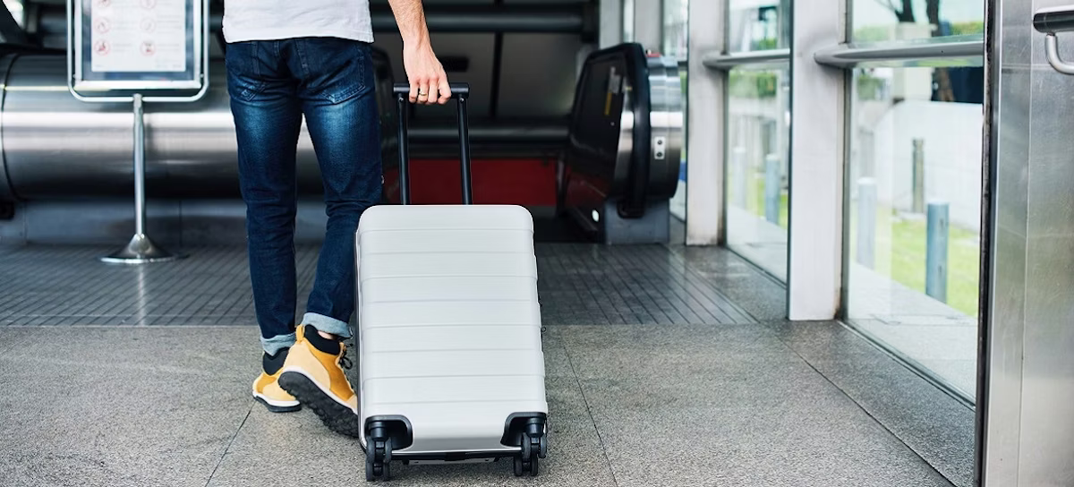 adult, male, man, person, baggage, clothing, footwear, shoe