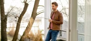 clothing, knitwear, sweater, adult, male, man, person, coat, jacket