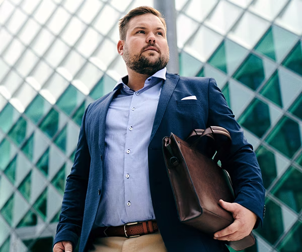 blazer, coat, jacket, adult, male, man, person, shirt, pants, handbag