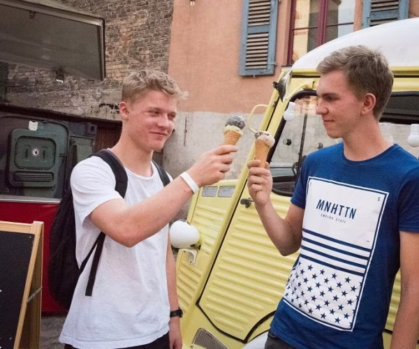 bracelet, boy, male, person, teen, t-shirt, backpack, wristwatch, ice cream, microphone