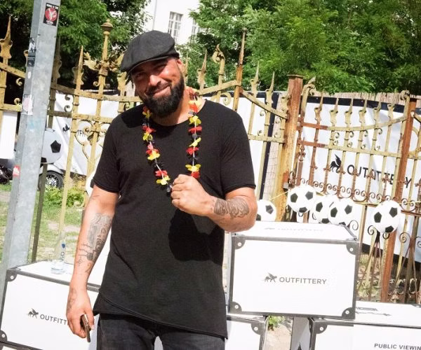 flower, flower arrangement, accessories, adult, male, man, person, ornament, necklace, hat