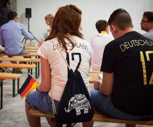 adult, male, man, person, female, woman, speaker, wristwatch, bench, handbag