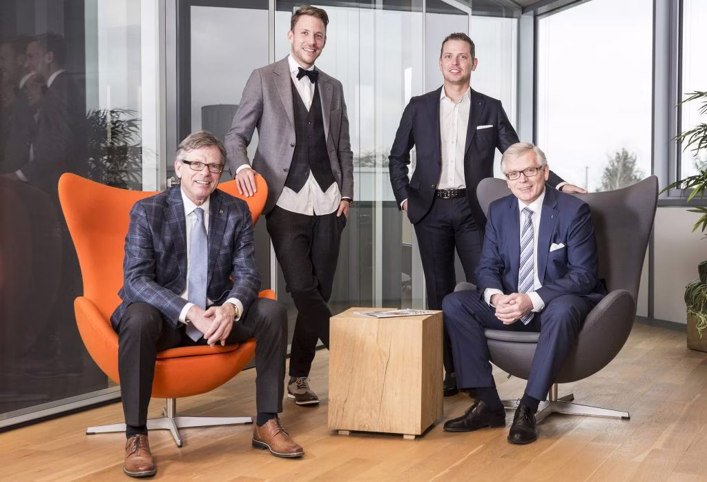 chair, groupshot, person, jacket, shoe, blazer, adult, male, man, tie