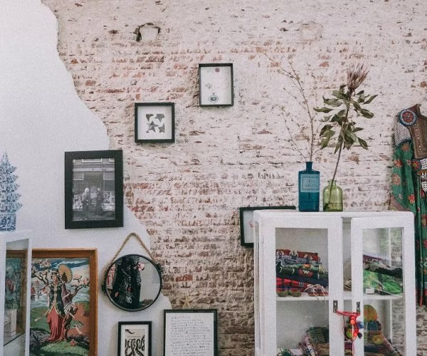 architecture, building, wall, plant, potted plant, art, painting, person