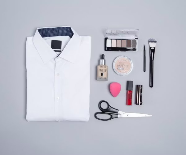 clothing, shirt, scissors, cosmetics, face, head, person, lipstick