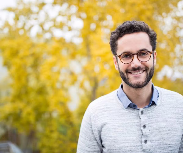 face, head, person, smile, glasses, adult, male, man, hair, black hair