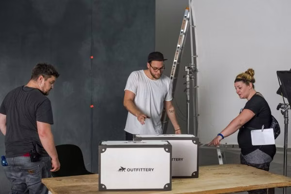 table, hat, adult, male, man, person, female, woman, desk, bracelet
