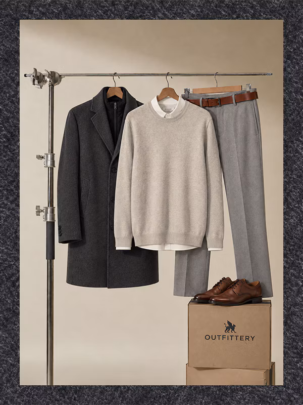 clothing, coat, box, footwear, shoe, knitwear, sweater, jacket, indoors, furniture