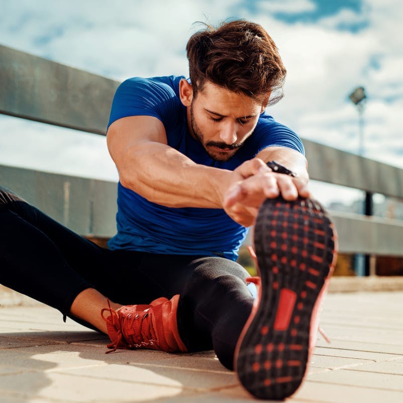 man stretching his legs