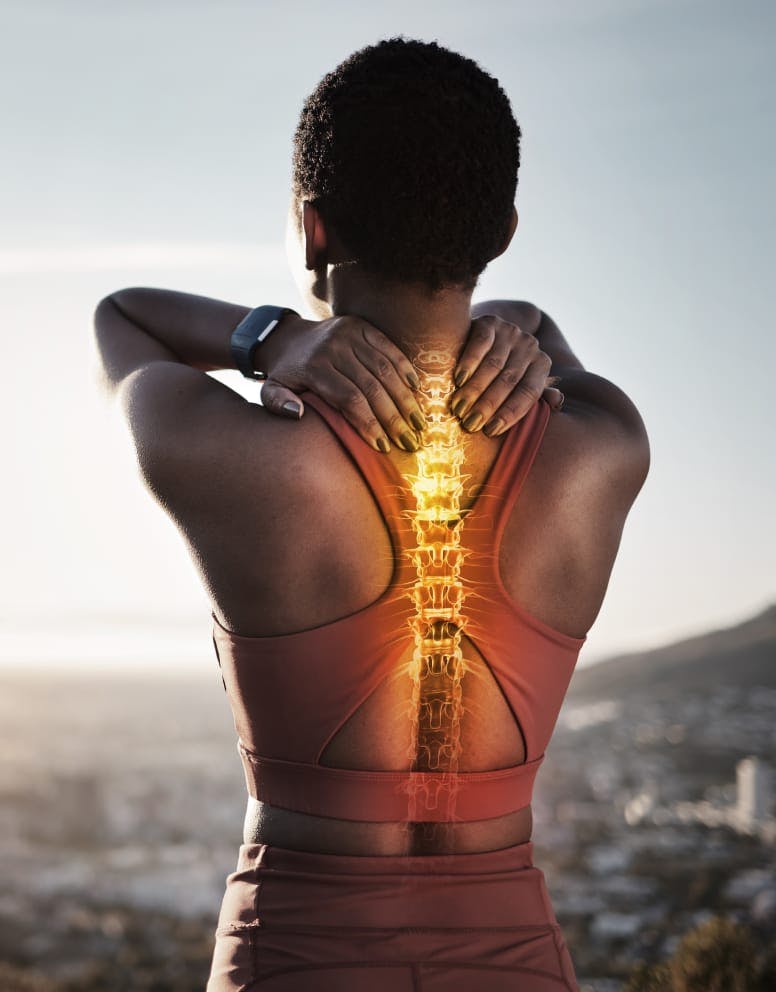 woman with her spine lit up