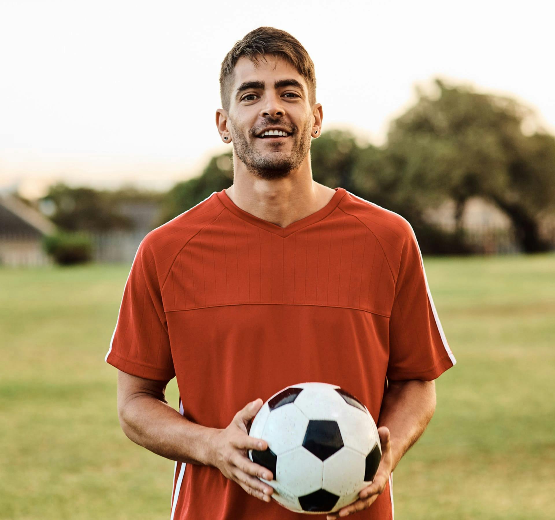 man holding a soccer ball