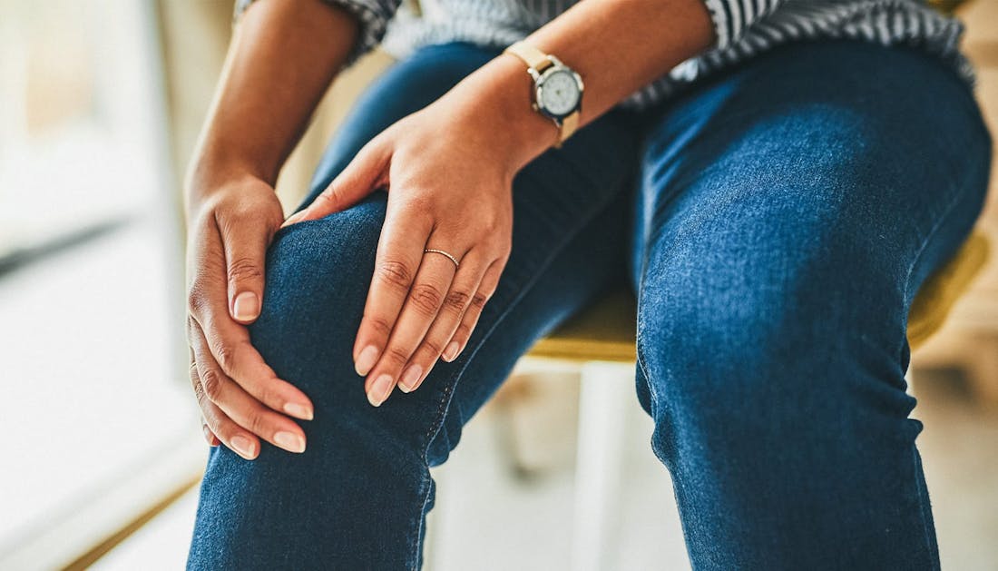 person holding their knee