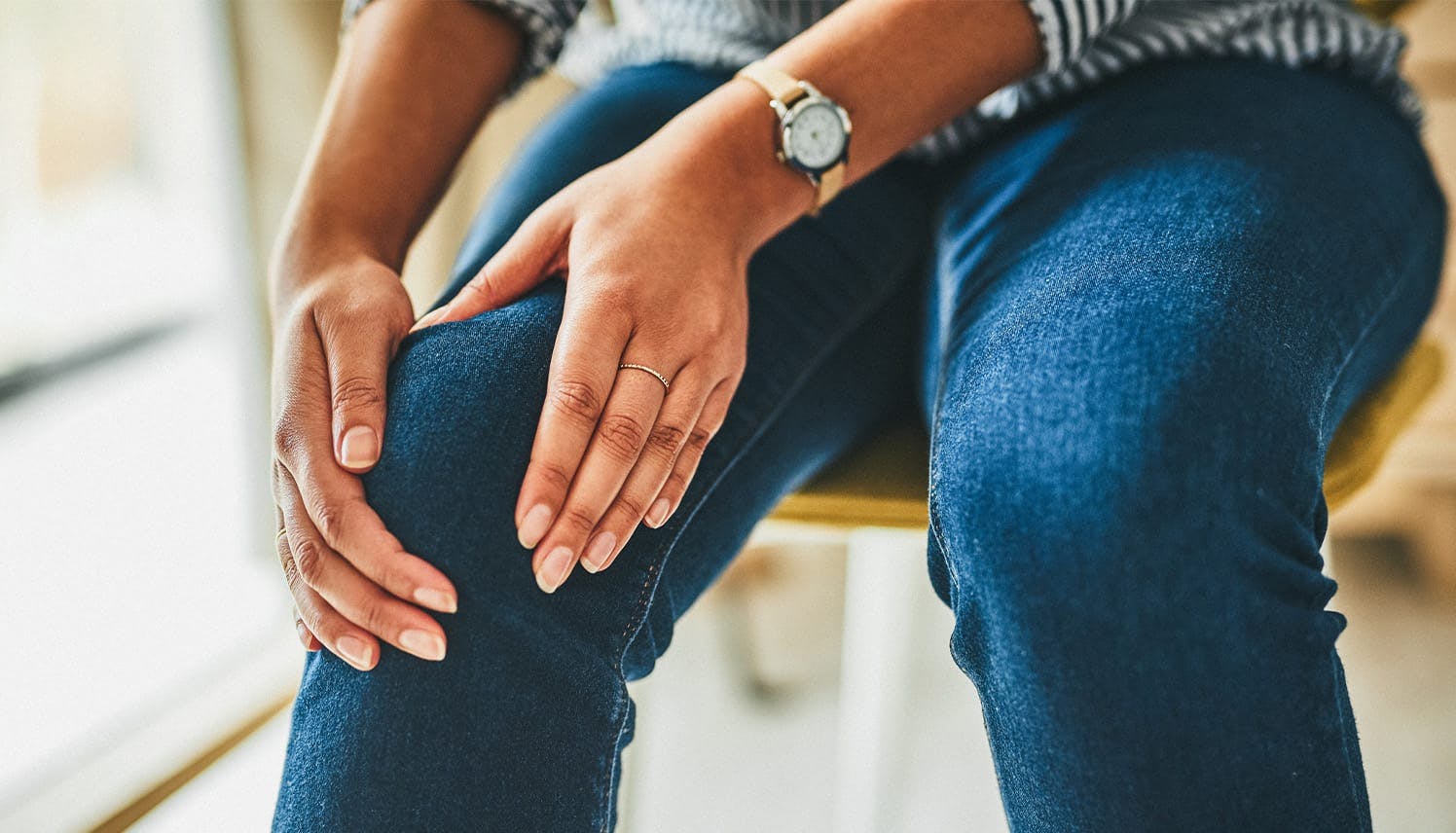 person holding their knee