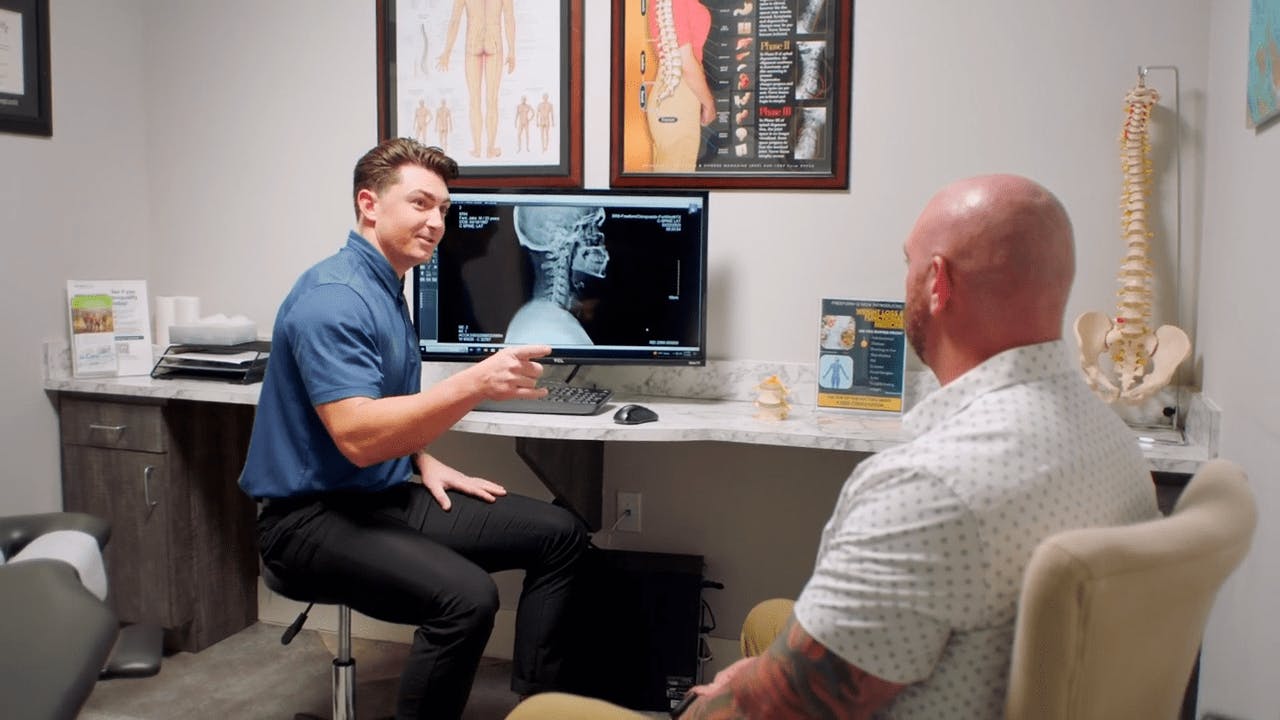 chripractor and patient speaking