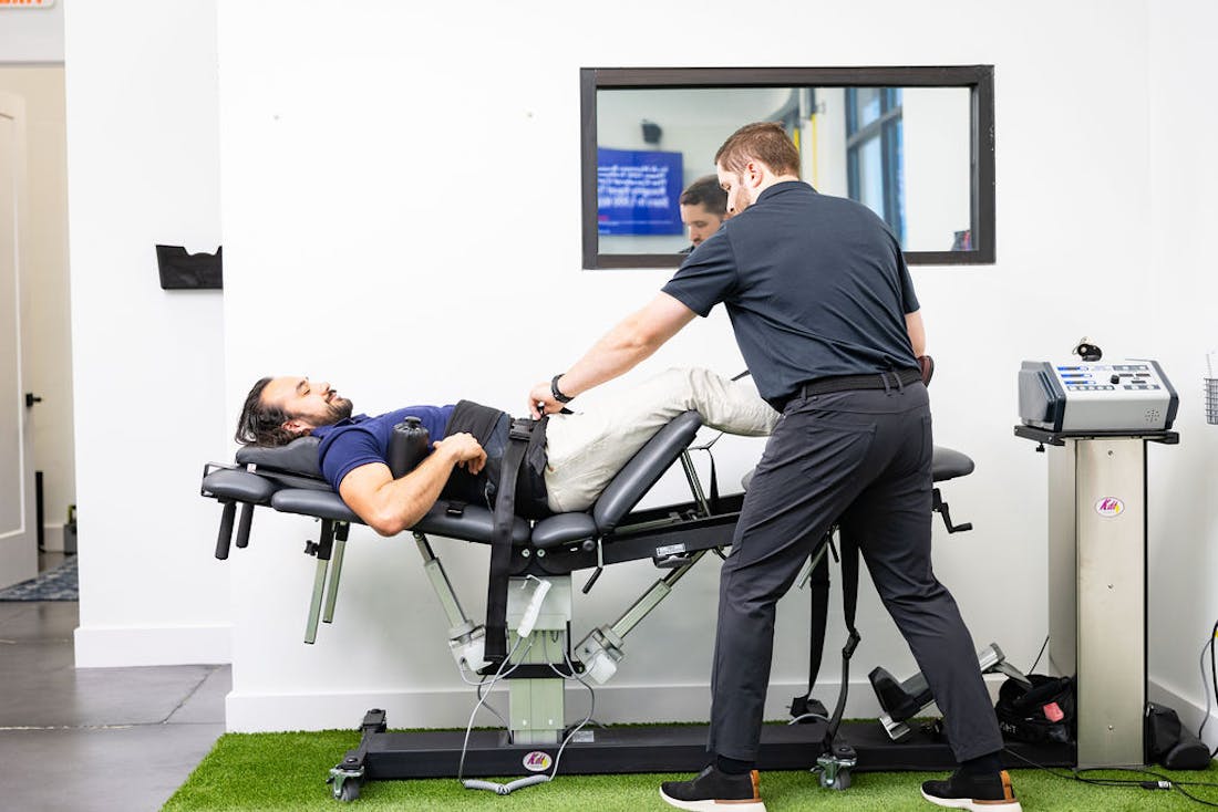 Chiropractor using active release machine