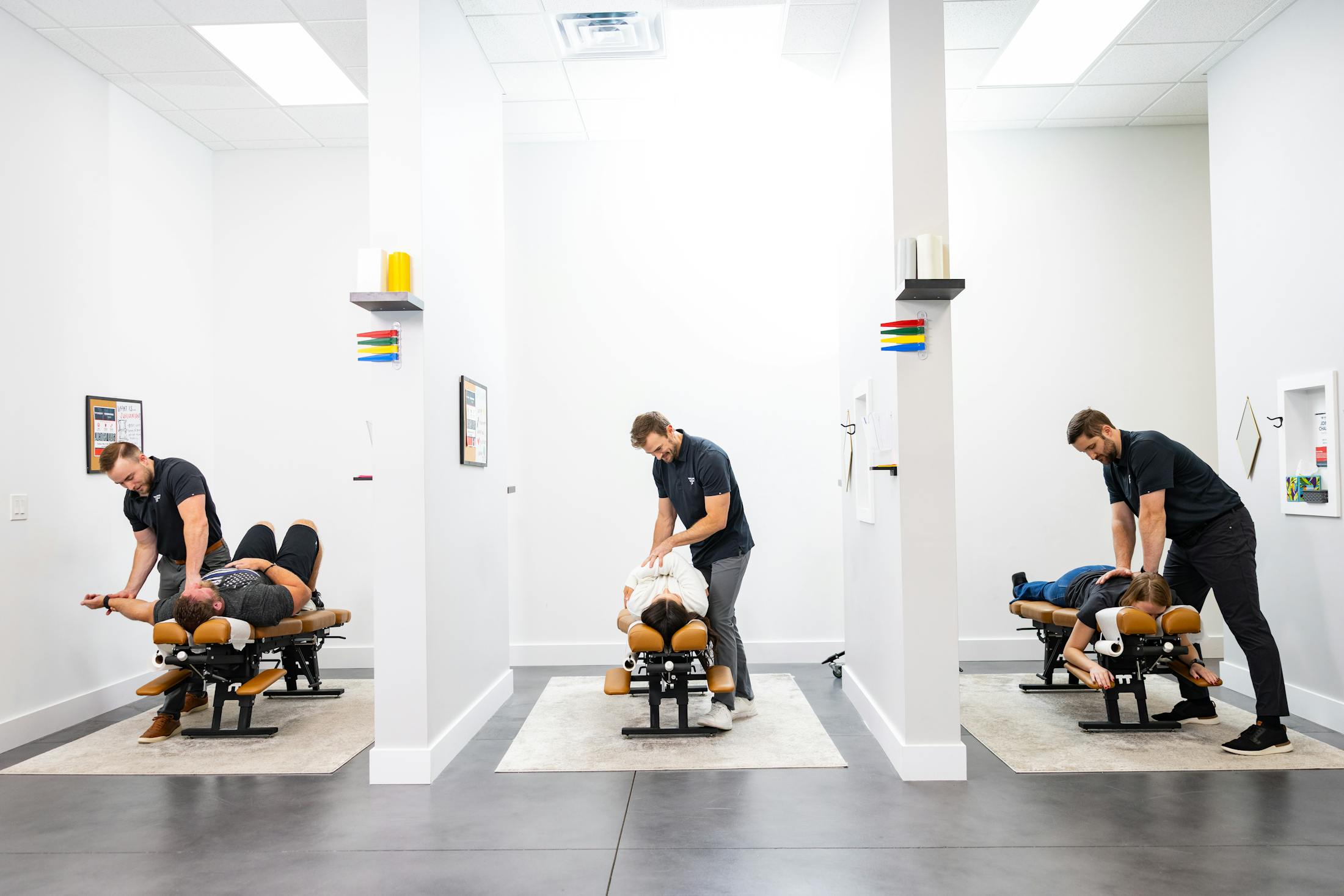 3 chiropractors at freeform adjusting
