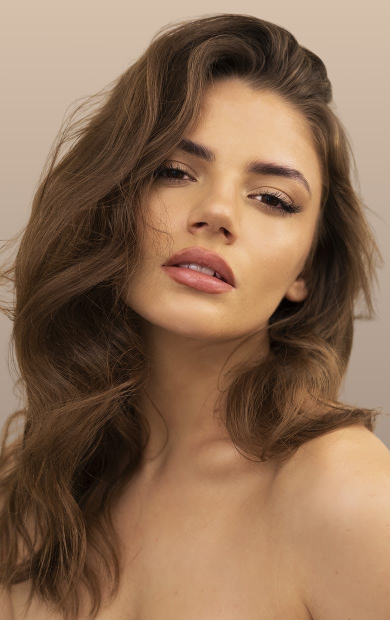 woman with wavy brown hair