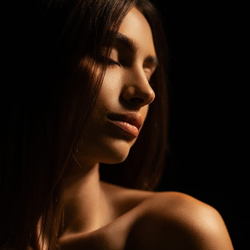 woman looking over her shoulder