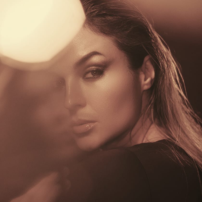 woman looking over her shoulder