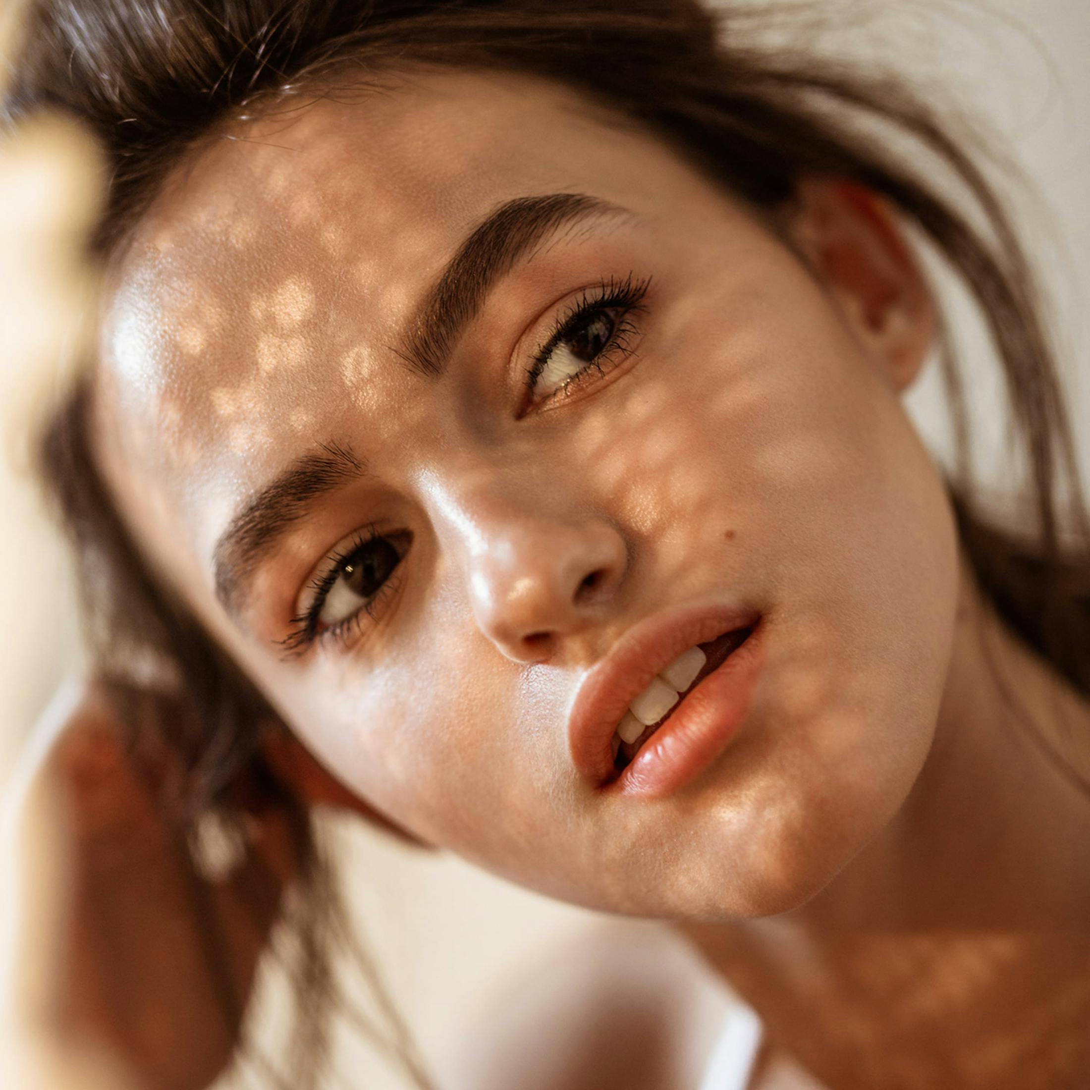 woman with shadows on her face