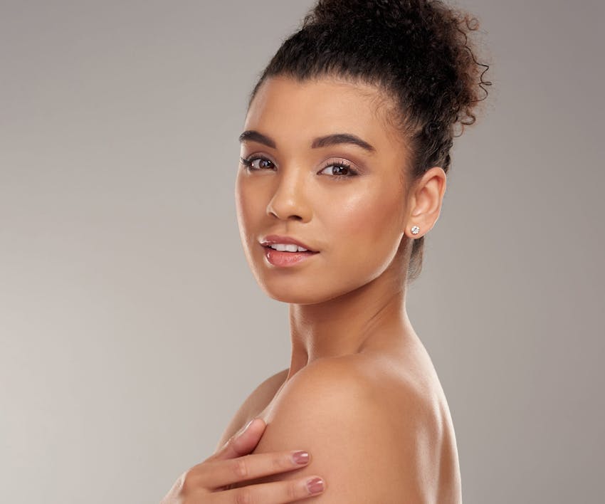 woman looking over her shoulder