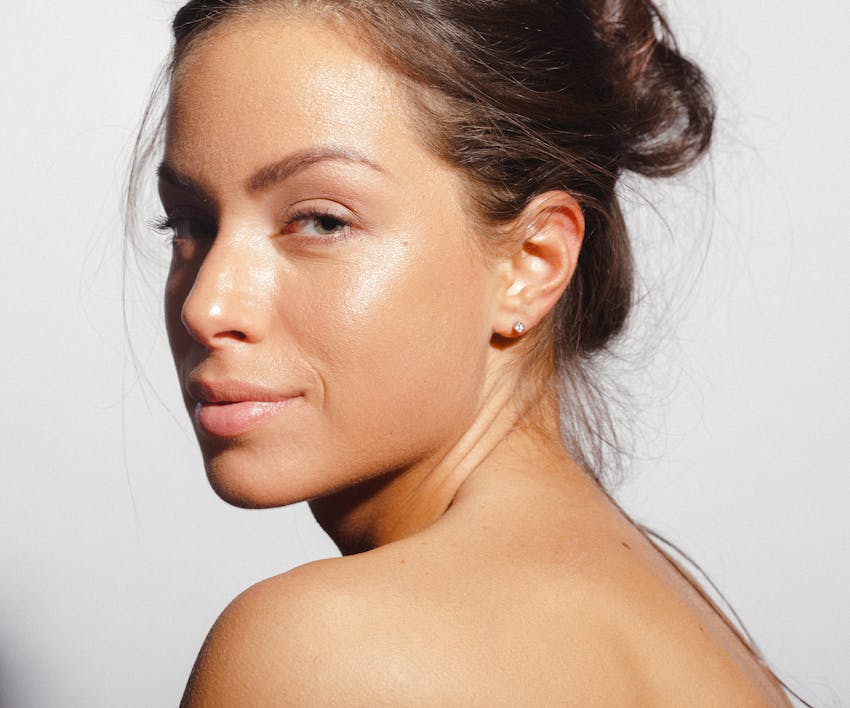 woman looking over her shoulder