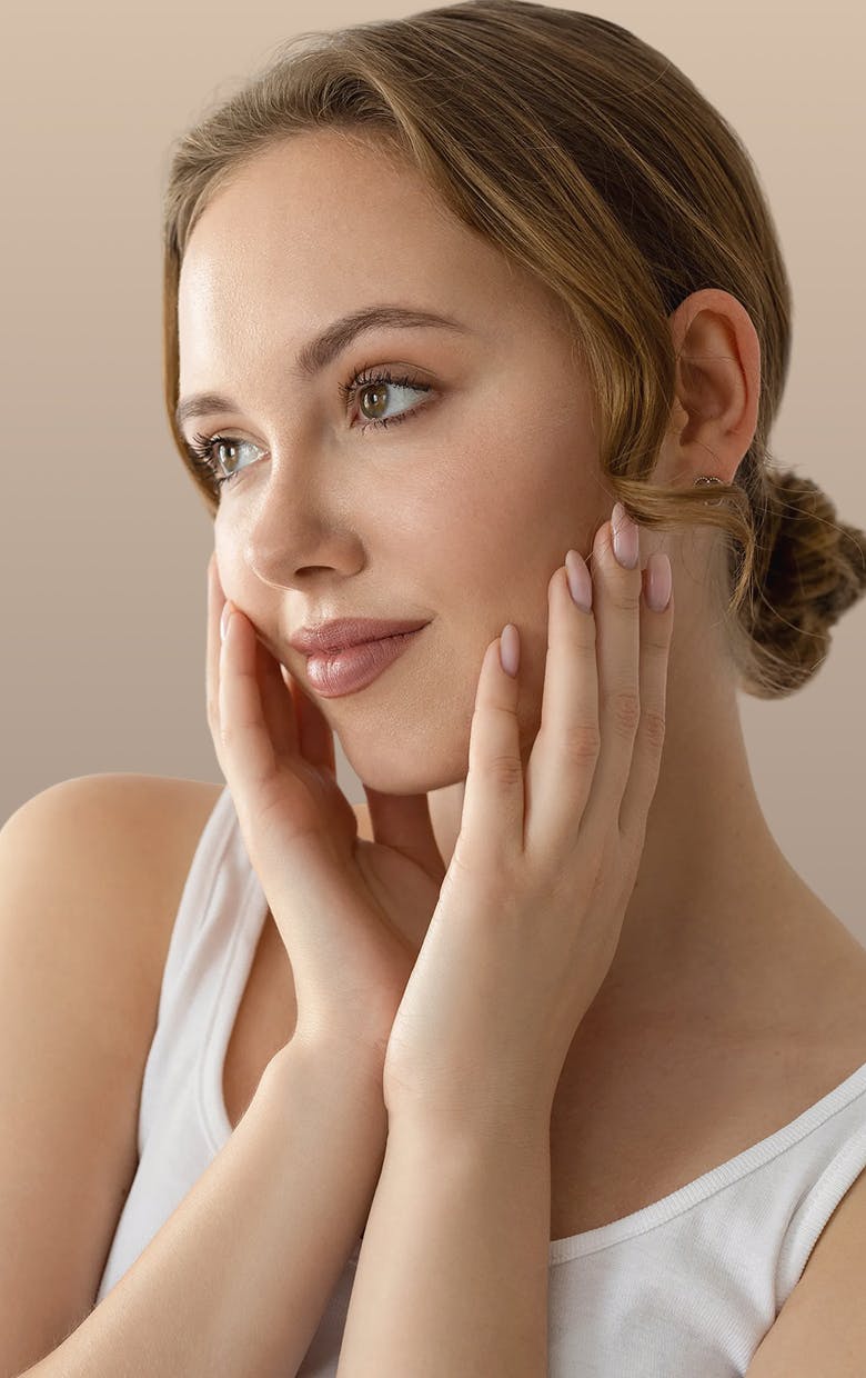 woman with hands on her face