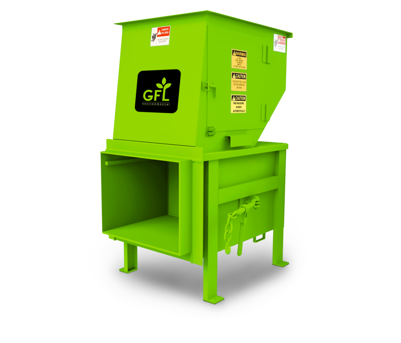 Stationary waste compactor serving a high-rise apartment building