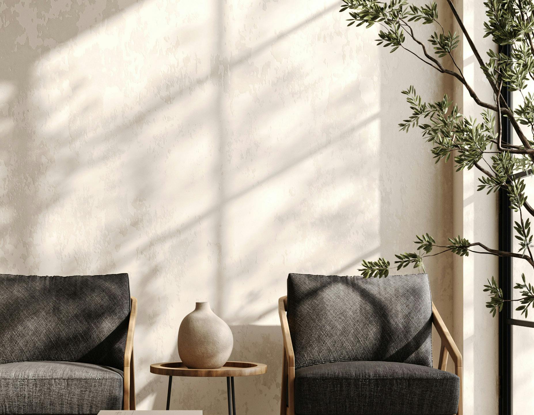 Two chairs next to a wiindow