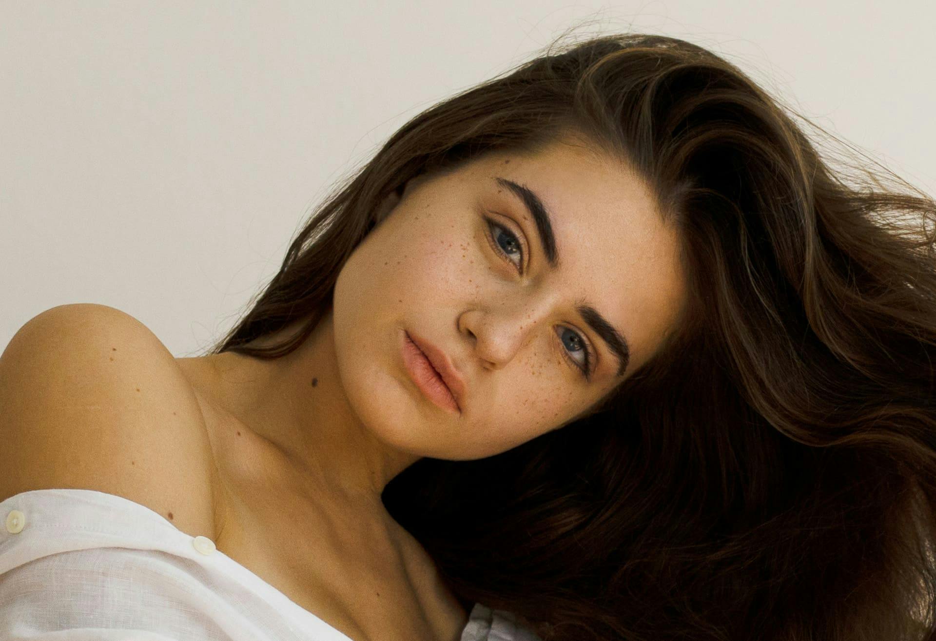 Woman leaning her head to one side