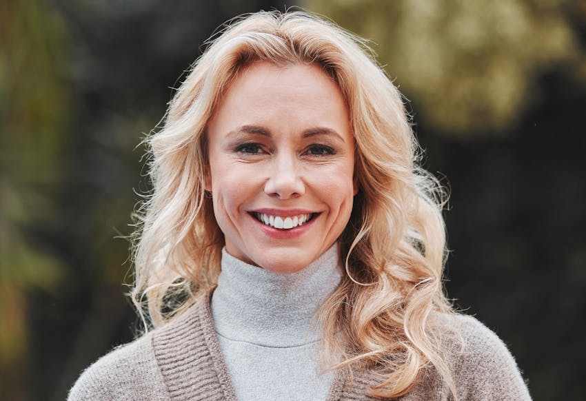 Woman smiling outside
