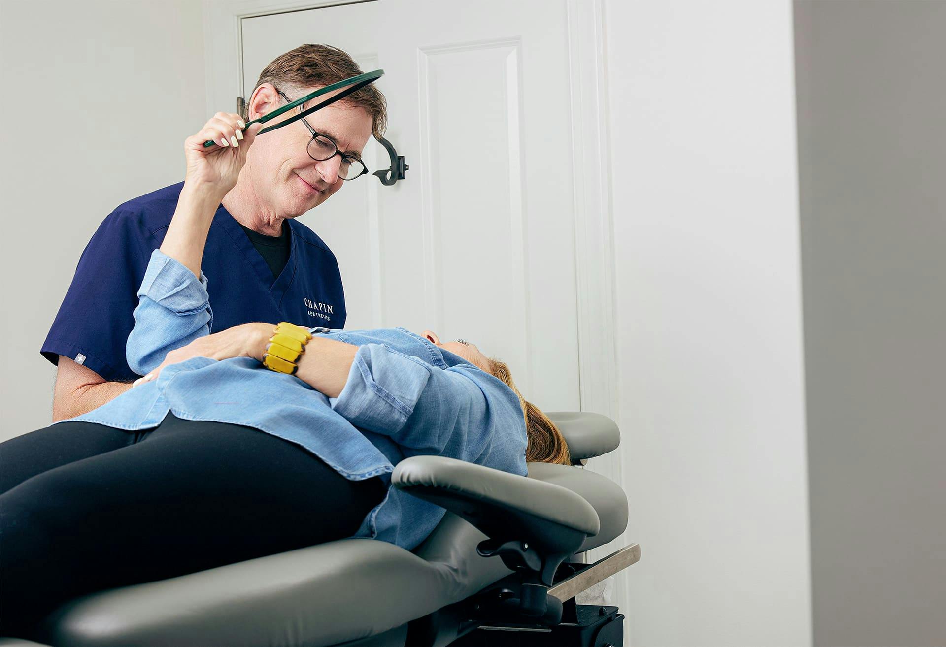 patient looking at mirror