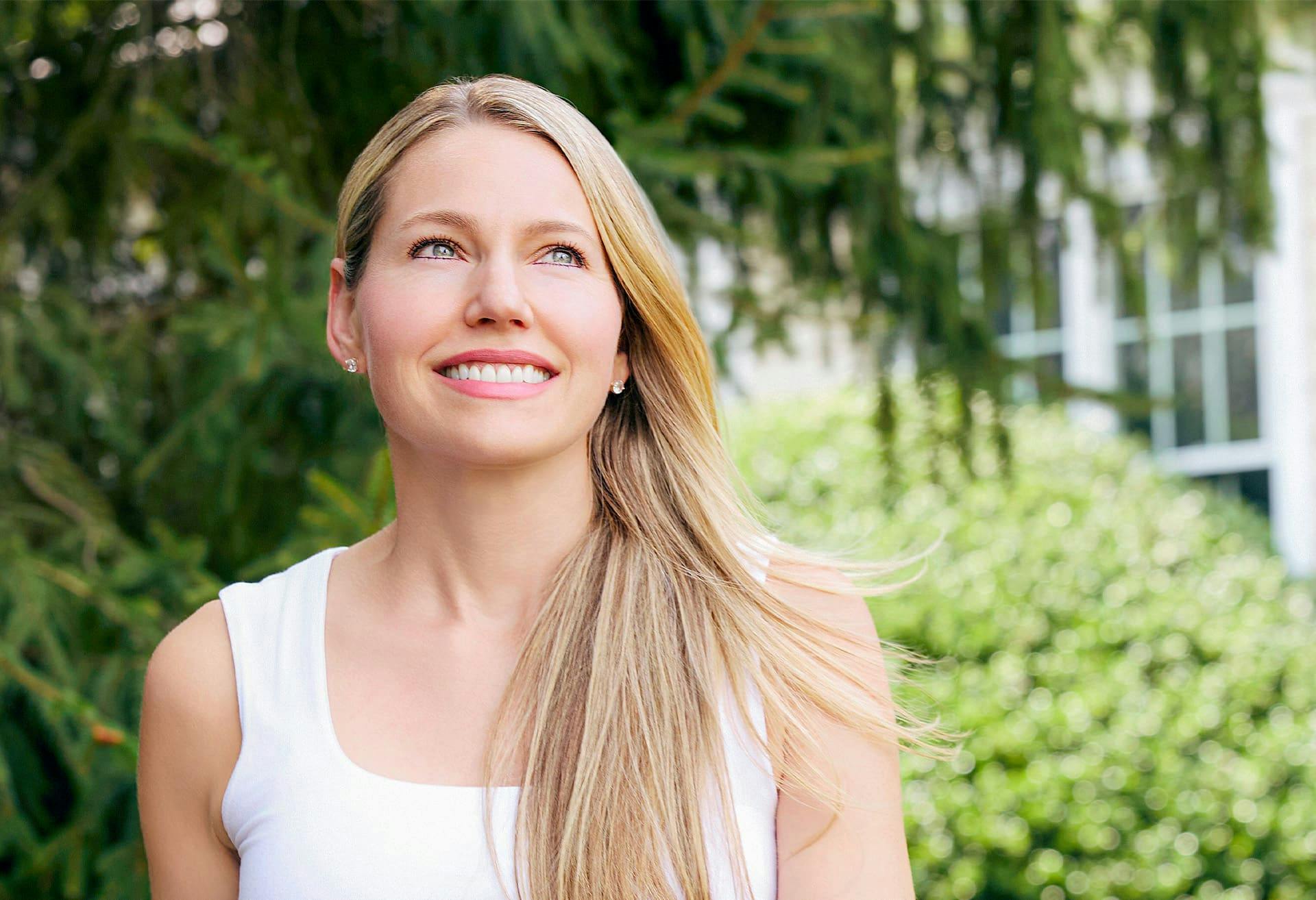 Woman smiling outside