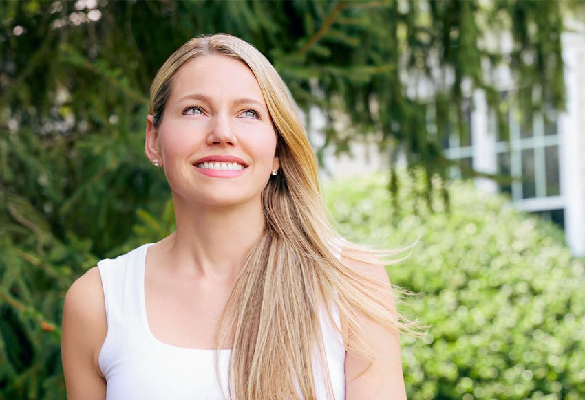 Woman smiling outside