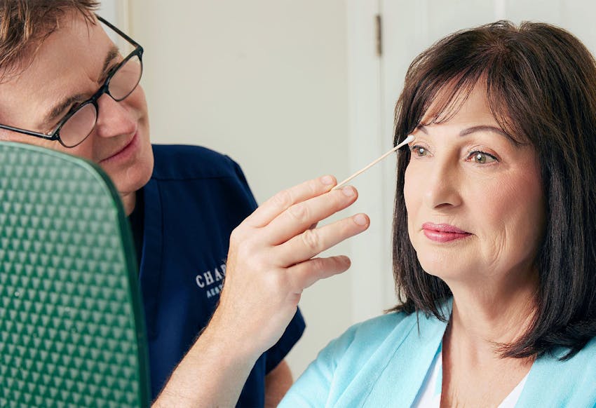 Woman and doctor during treatment