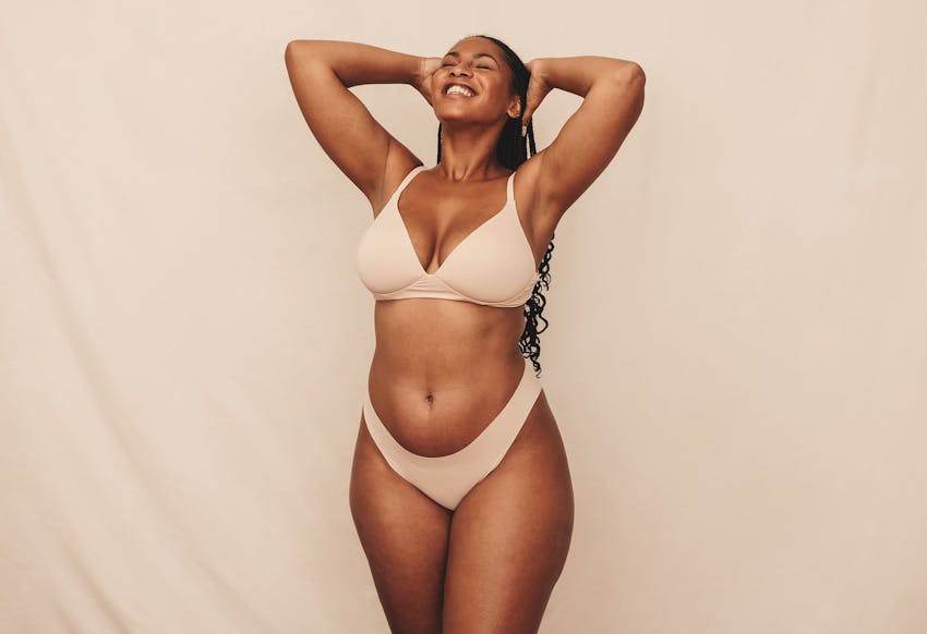 Woman with her arms up
