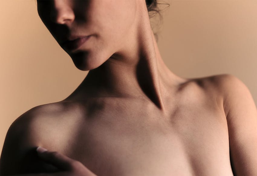 A womans neck and chest