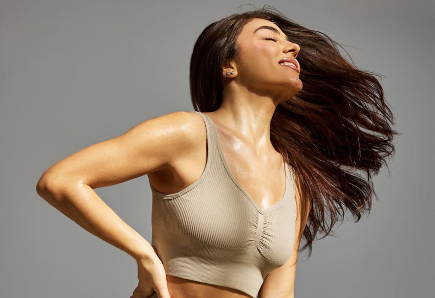 Woman looking upwards and smiling