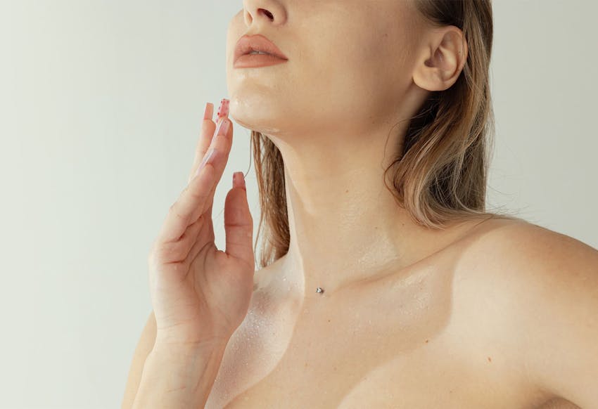 Woman touching chin