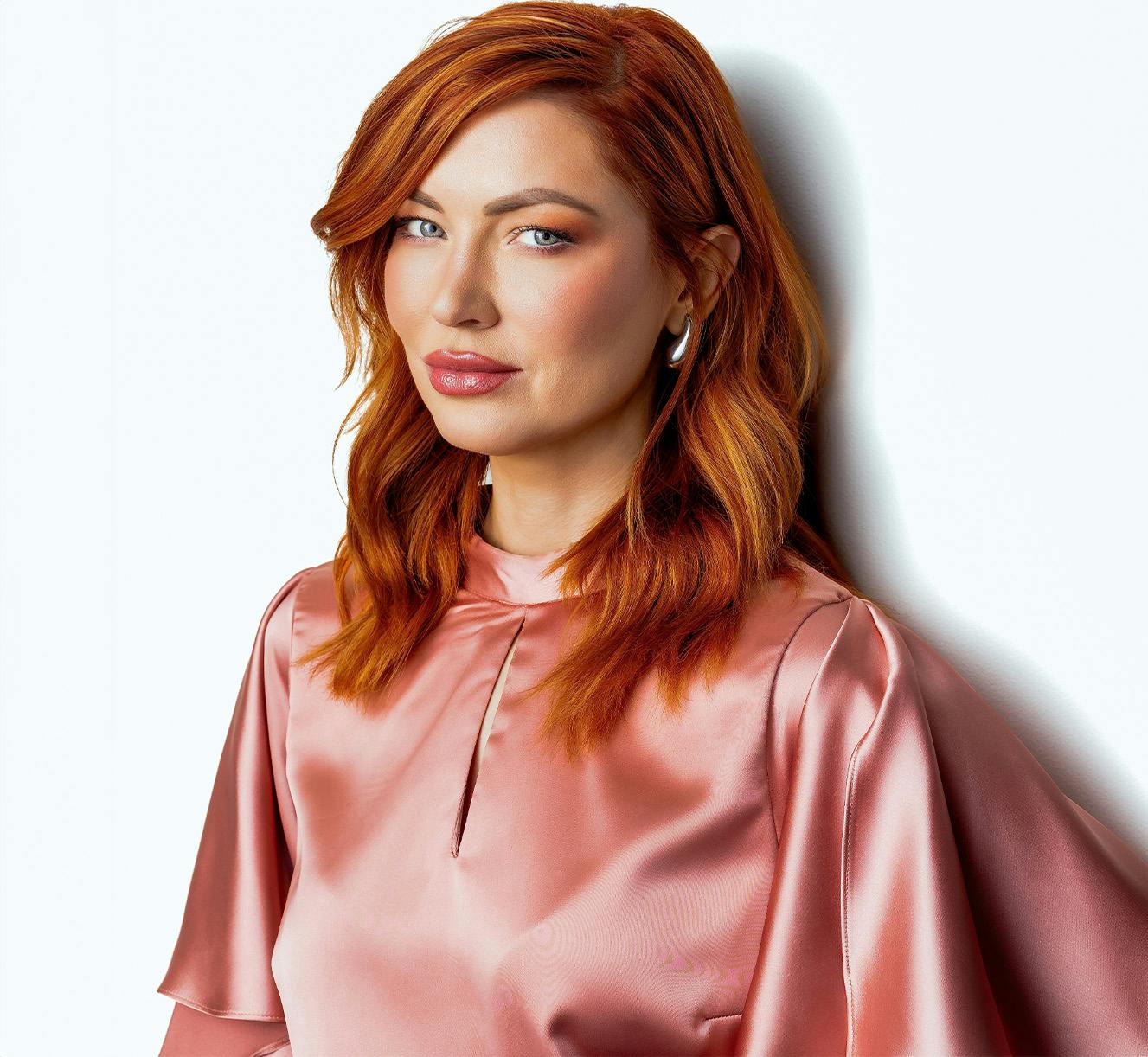 woman leaning against wall