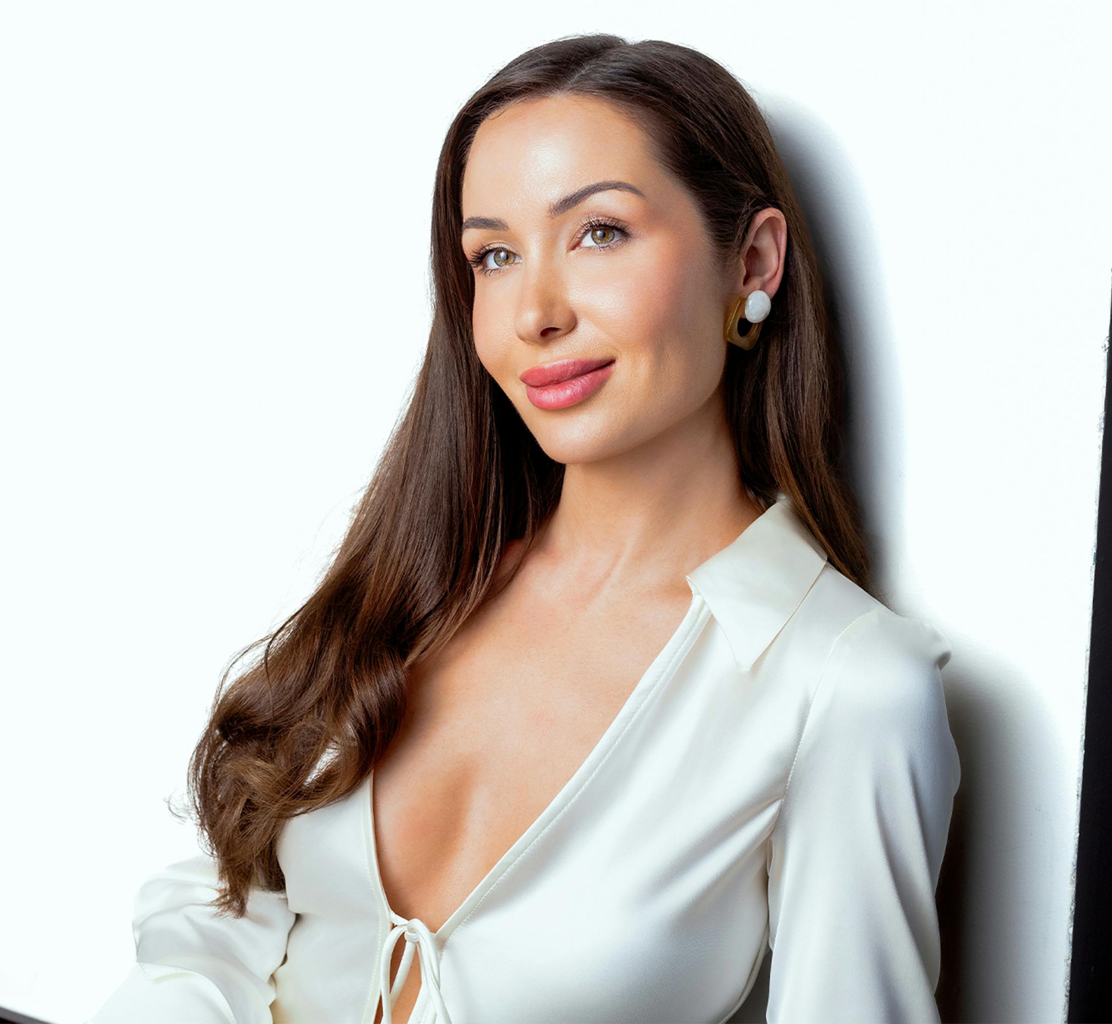 woman leaning against wall