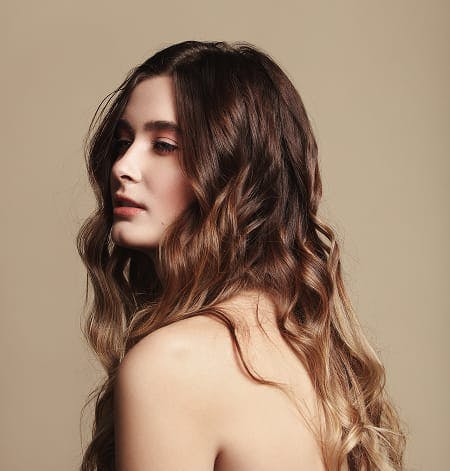 woman with long curly hair