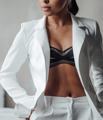 woman in a white coat