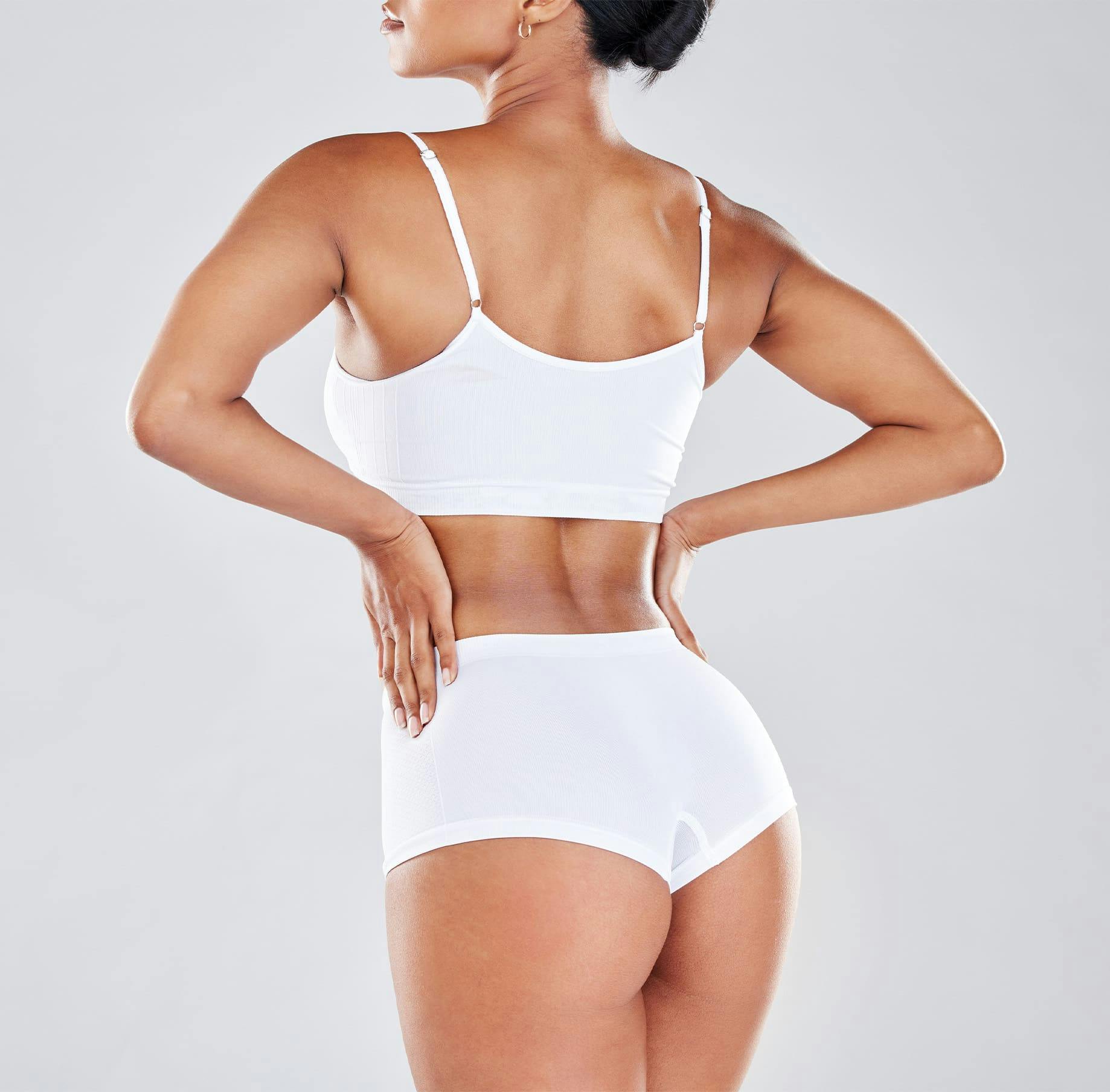 A woman touching her waist