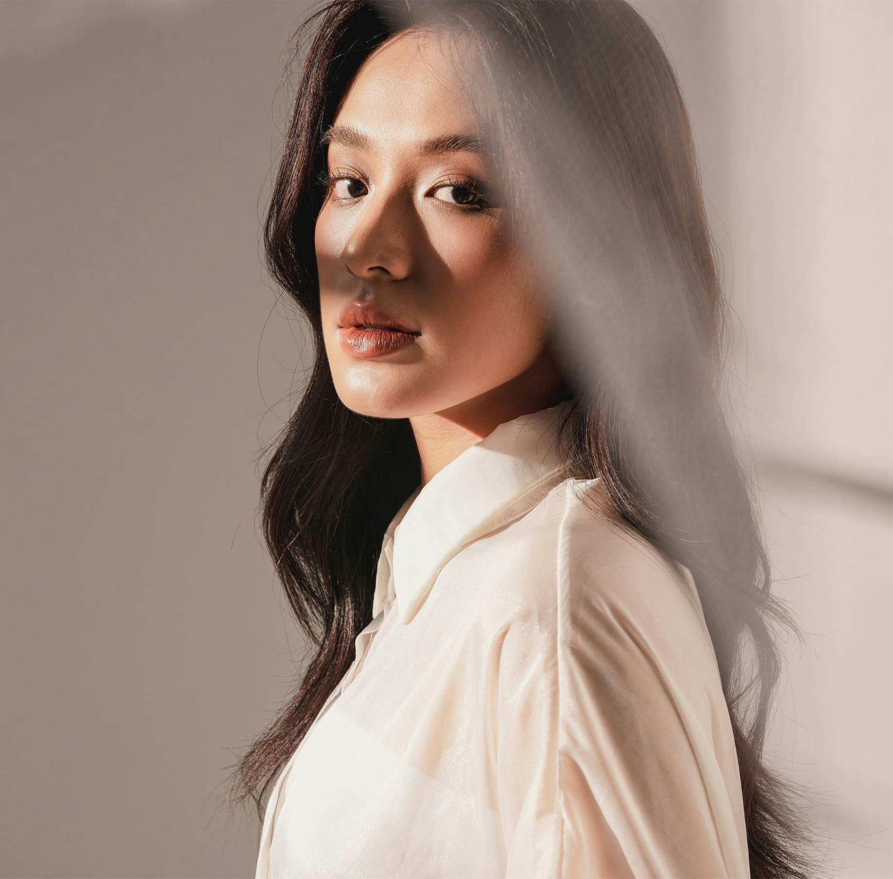 Woman in a dark room