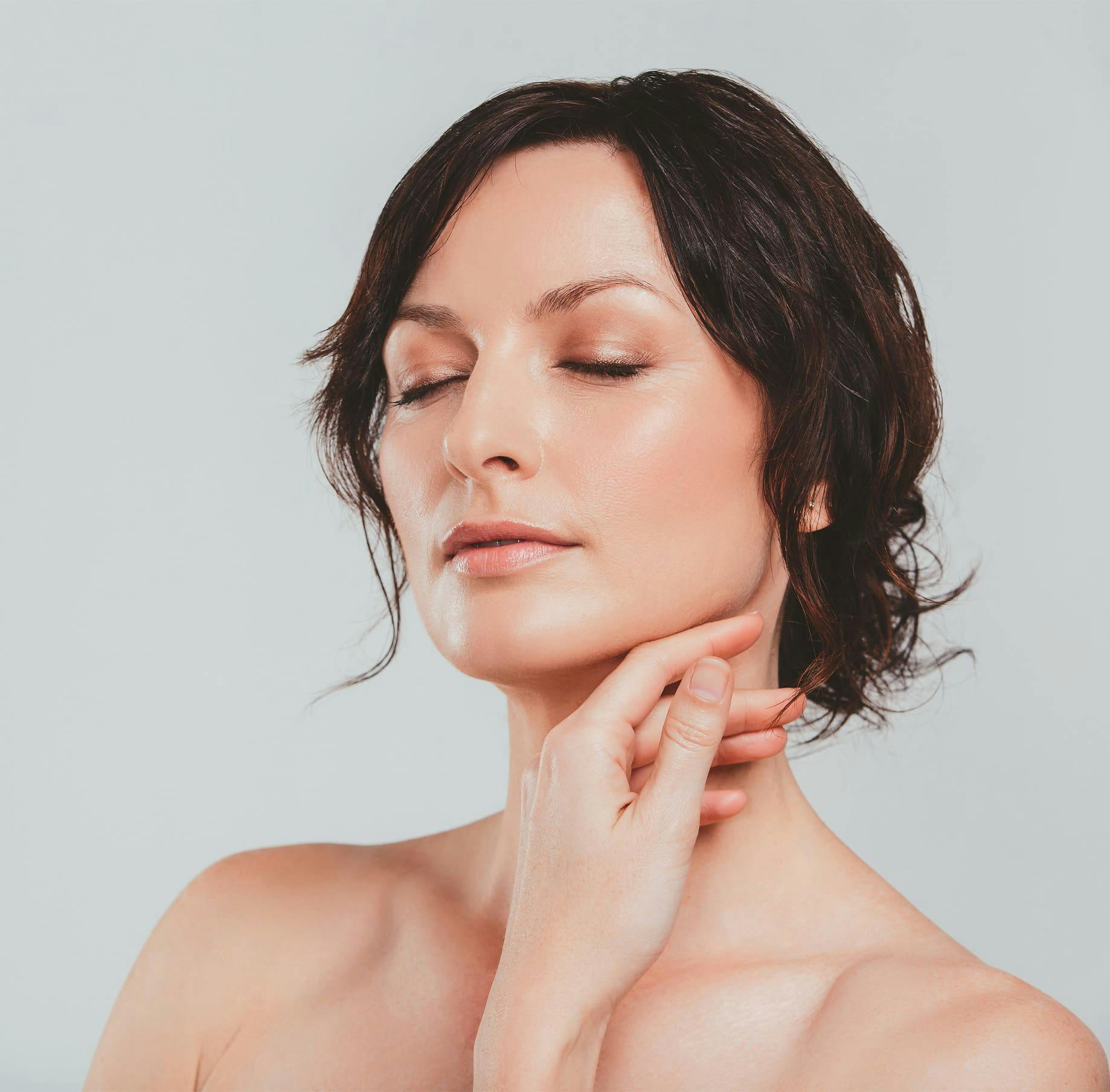 Woman with eyes closed