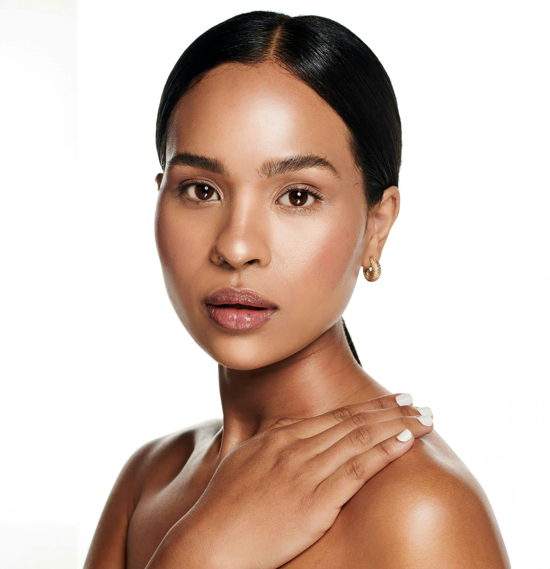 Woman touching chest