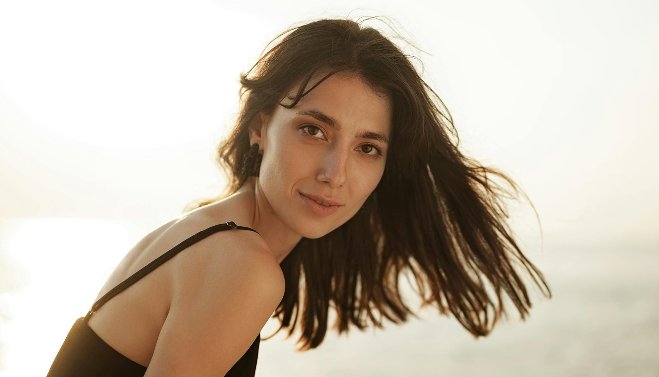 woman's hair flowy in the wind