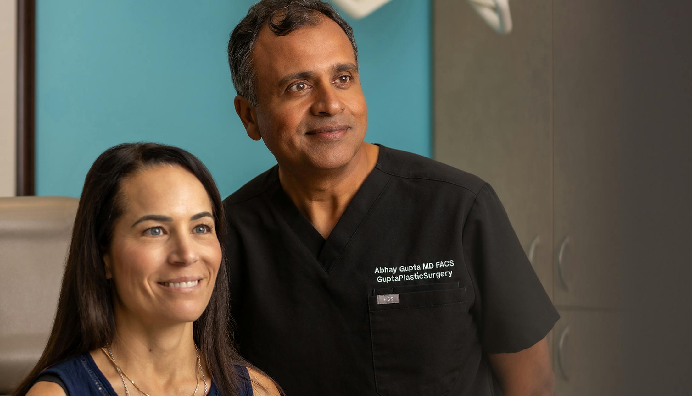 Dr. Abhay Gupta with female patient