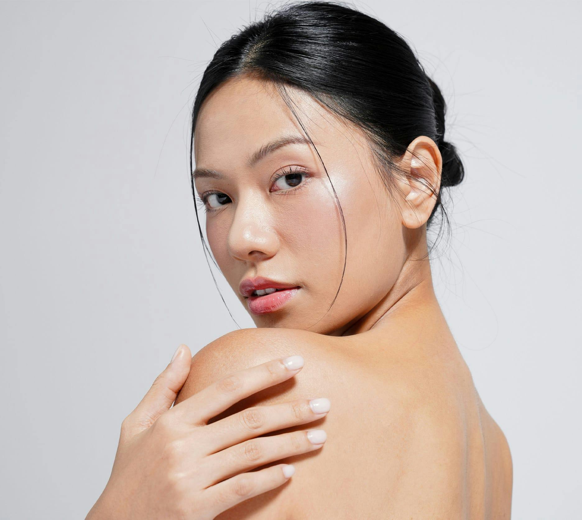 woman looking over her shoulder